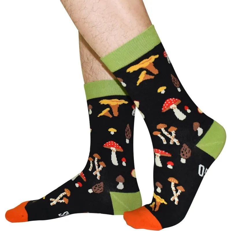 Black socks pair skateboard hip with happy harajuku mushroom letter printed pattern and green cuffs accented in orange