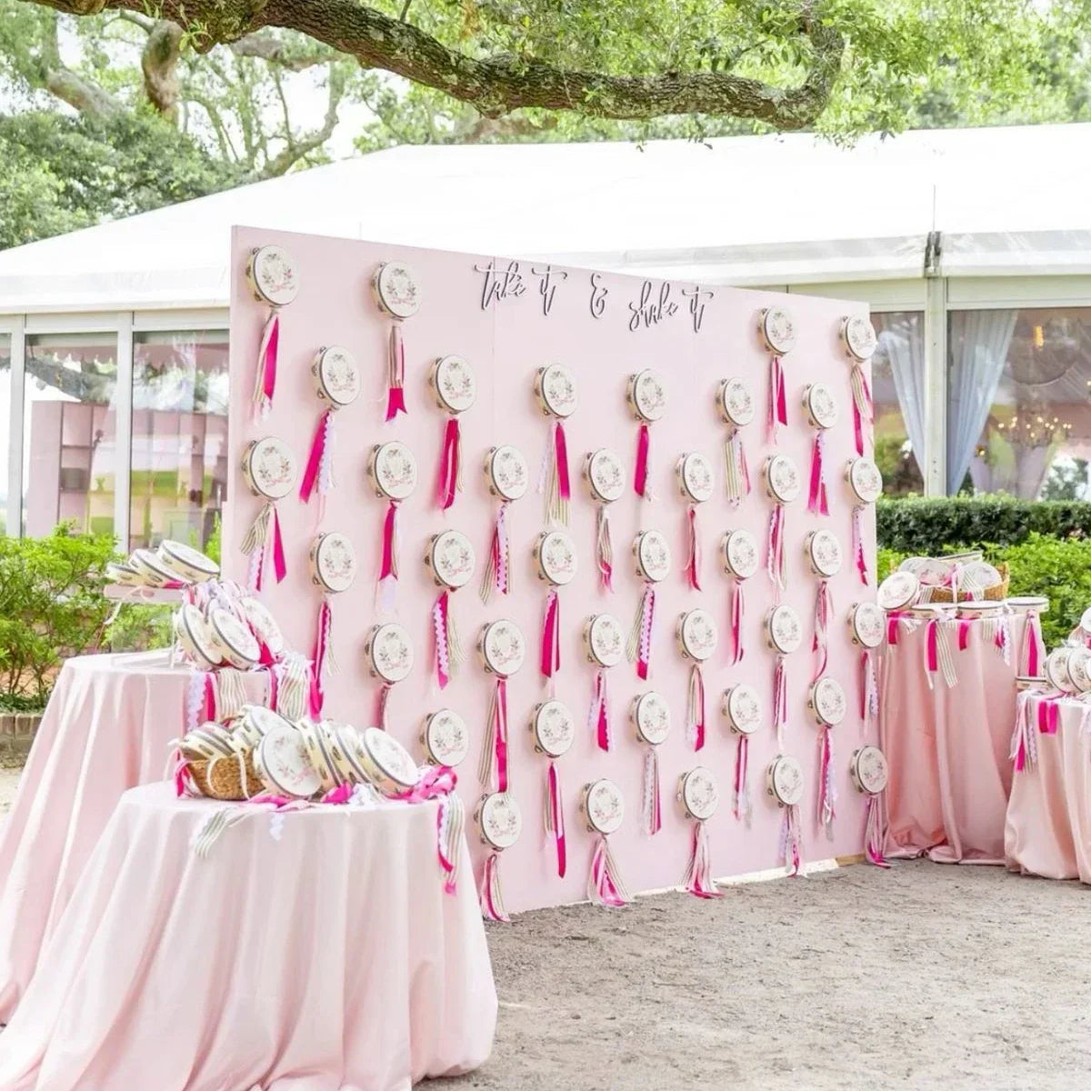 Pink wedding tambourines with decorative tassels and shake it sign as musical instruments tambourine for adults hand drums