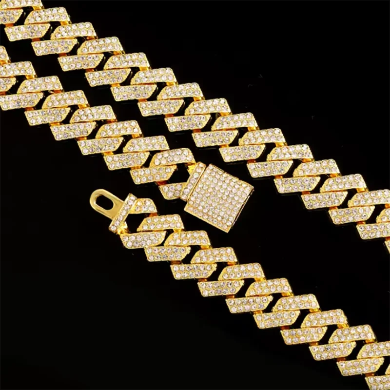 Gold-colored 16mm hip hop miami cuban link chain necklace with thick interlocking links and clear cubic zirconia stones