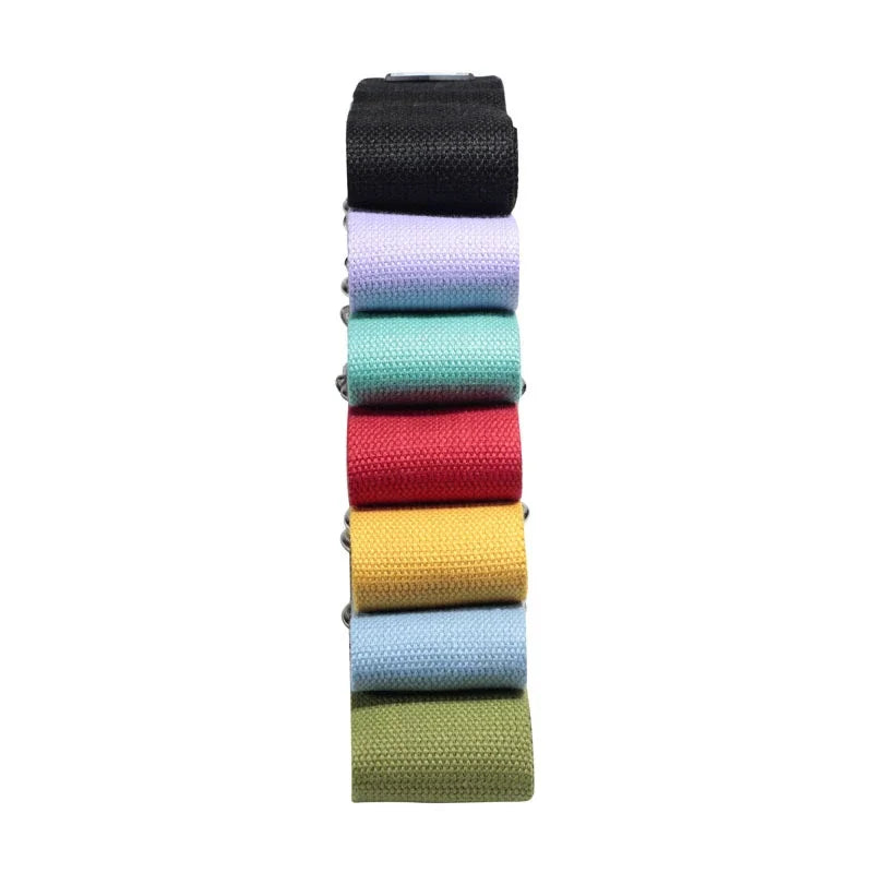 A stack of seven colorful woven fabric electric guitar strap parts for acoustic bass electric instruments adjustable width