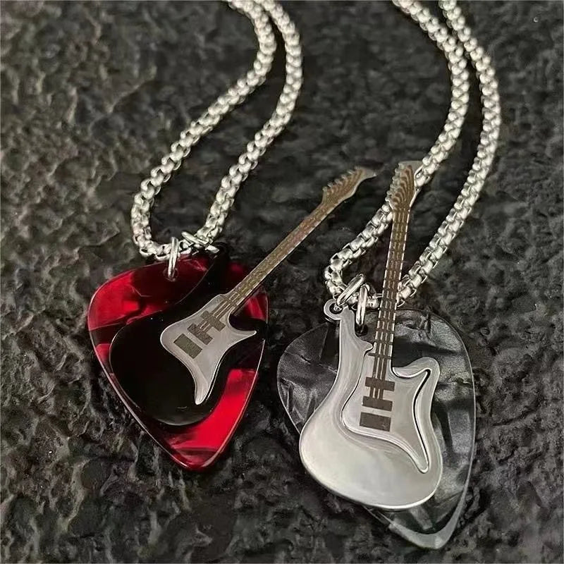 Two guitar pick pendent necklaces featuring red translucent and black marbled picks with silver guitar designs on stainless steel chains
