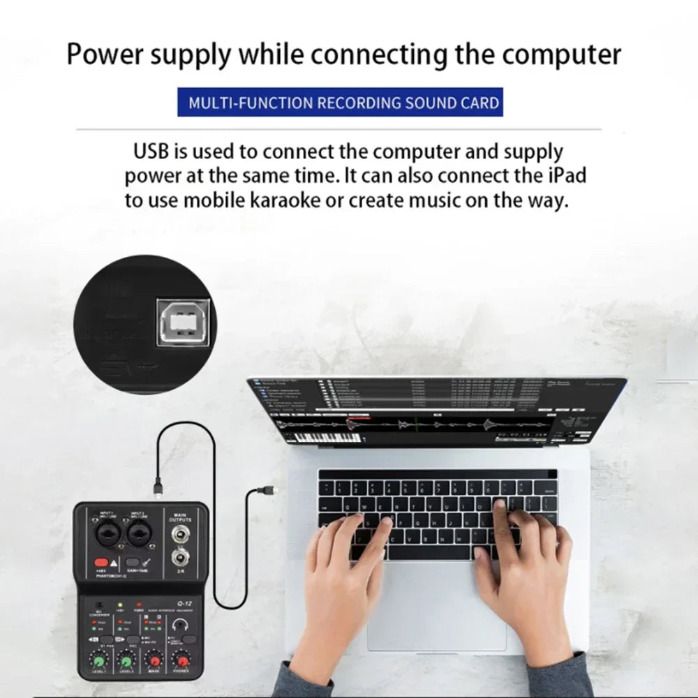 Black q-12 professional portable audio interface sound card with usb port and audio controls for guitar recording studio