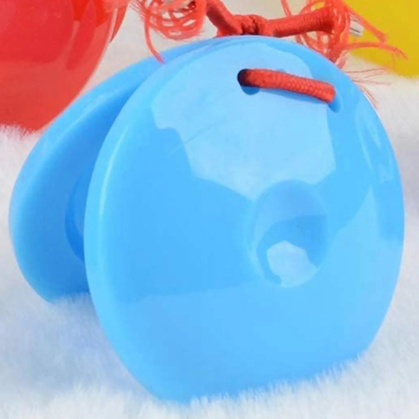 Blue plastic finger castanets rhythm clappers with red cord handles preschool musical percussion instruments toys