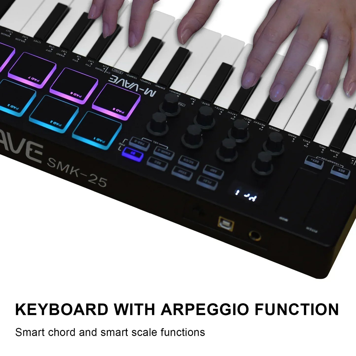 Black m-audio smk-25 mini portable usb keyboard with 25 velocity sensitive keys and rgb backlit pads in purple and blue