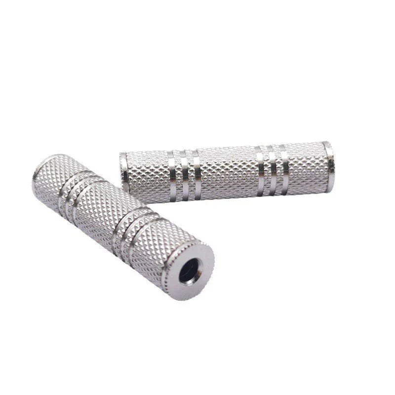 Silver metallic 3.5mm female audio stereo coupler socket adapter with textured diamond pattern and three horizontal ridges