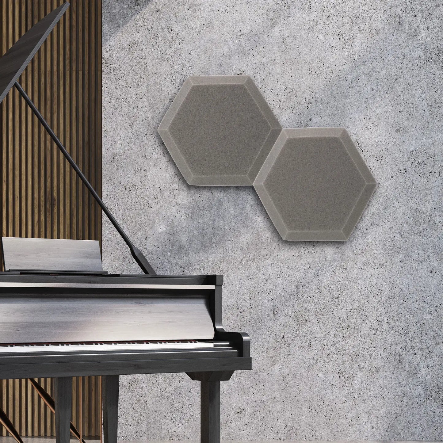 Two matte gray 2pcs hexagon sound professional acoustic foam panels mounted on a textured concrete wall for home studio recording