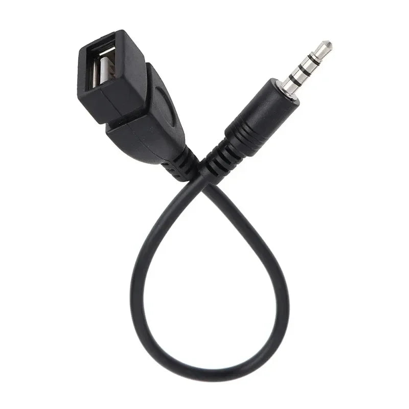 Black car aux usb audio cable with molded plastic housing and metallic 3.5mm connector for cable car electronics use