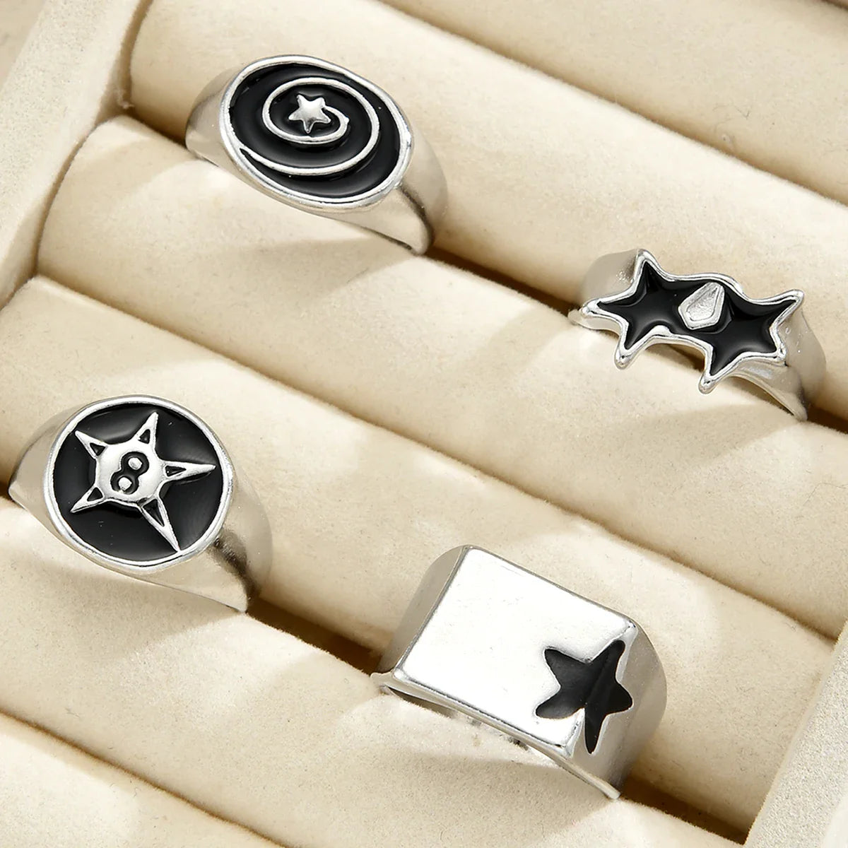 Set of four silver-tone pcs punk black finger ring y2k with black star rings and geometric enamel star motifs