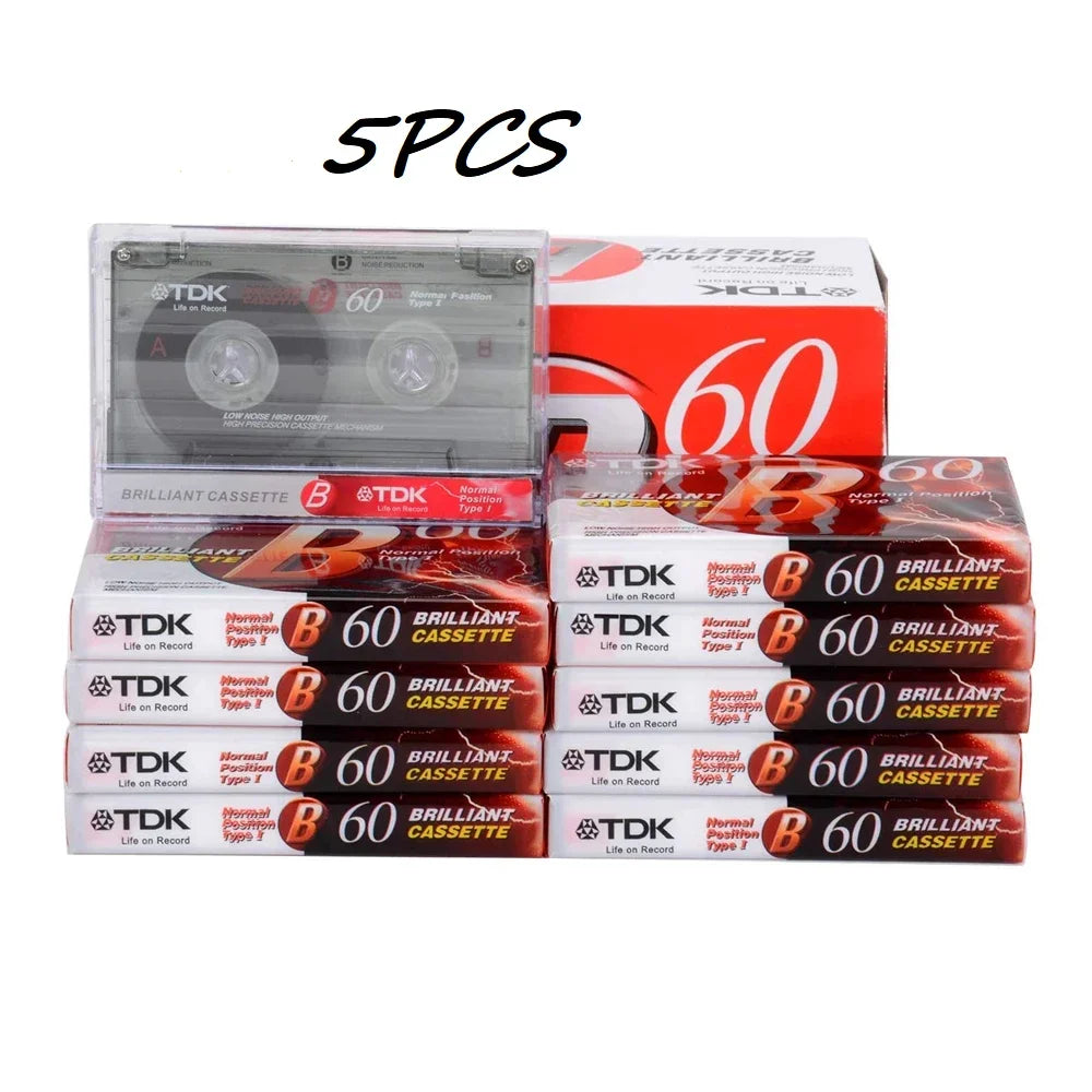 Tdk high qulity standard cassette blank tapes with red and white packaging and magnetic audio tape for recording