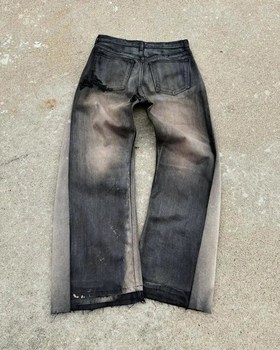 Dark gray distressed american hip hop mens jeans with waist frayed patchwork embroidery micro flared design and raw hems