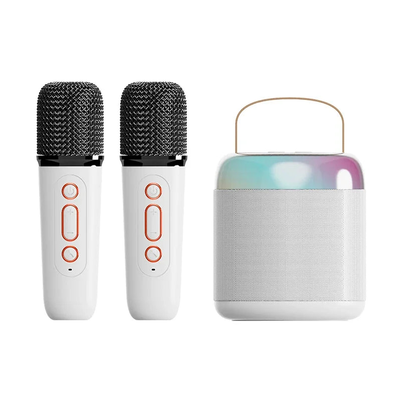 White wireless basix speaker microphone with black mesh grilles and rose gold buttons paired with portable spe soundspeaker for karaoke family wireless use