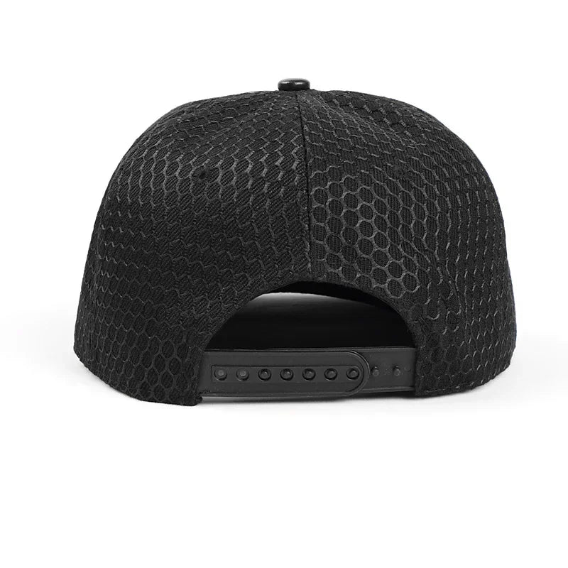 Black snapback cap with textured honeycomb fabric and adjustable strap from brand oohmy royal king crown baseball collection