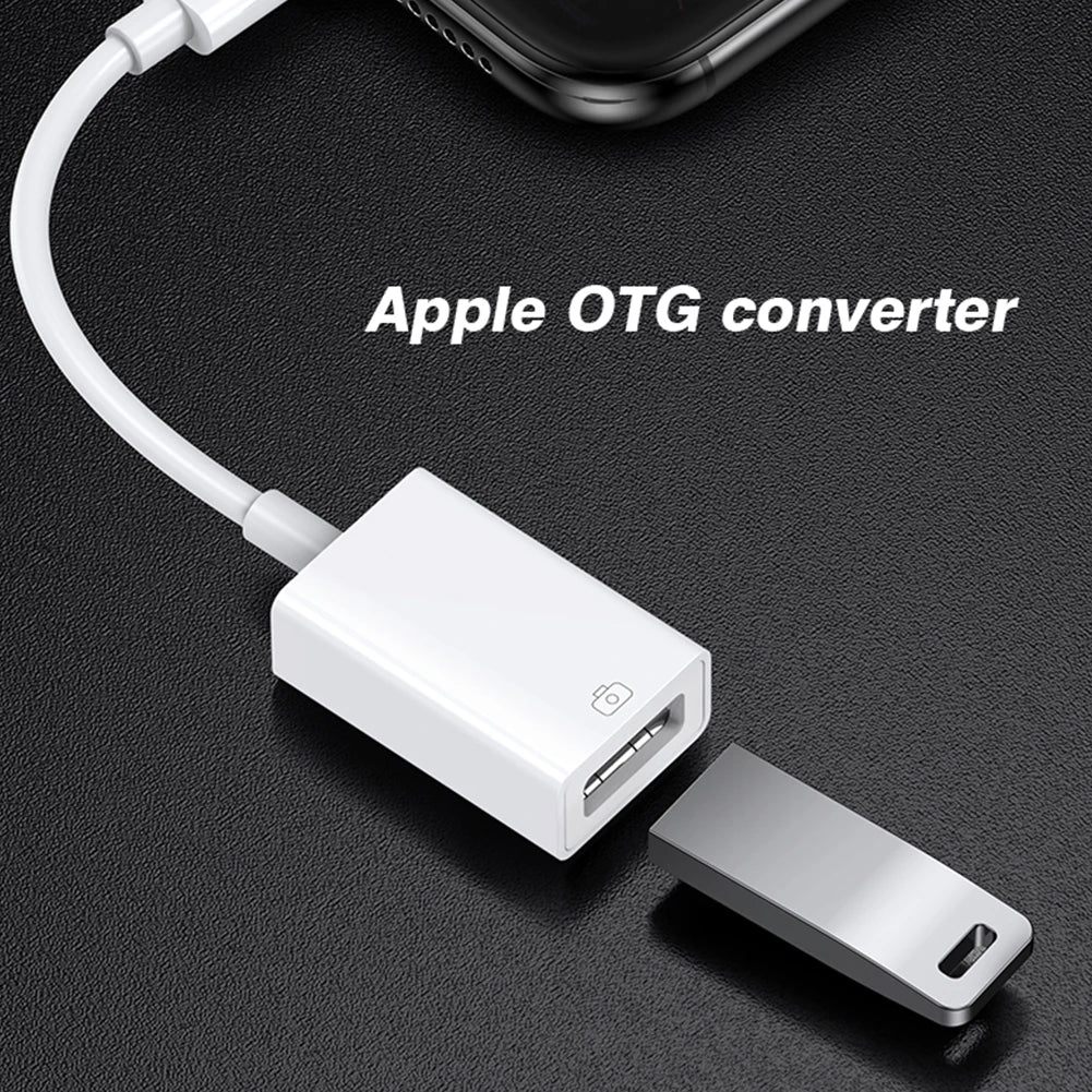 White byscoon otg adapter cable converter with lightning and usb-a port alongside a silver flash drive for iphone use