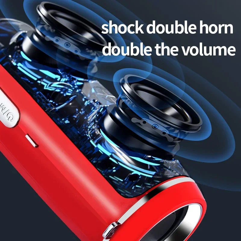 Red portable wireless speaker with transparent blue casing and dual black shock horn drivers for high power outdoor use