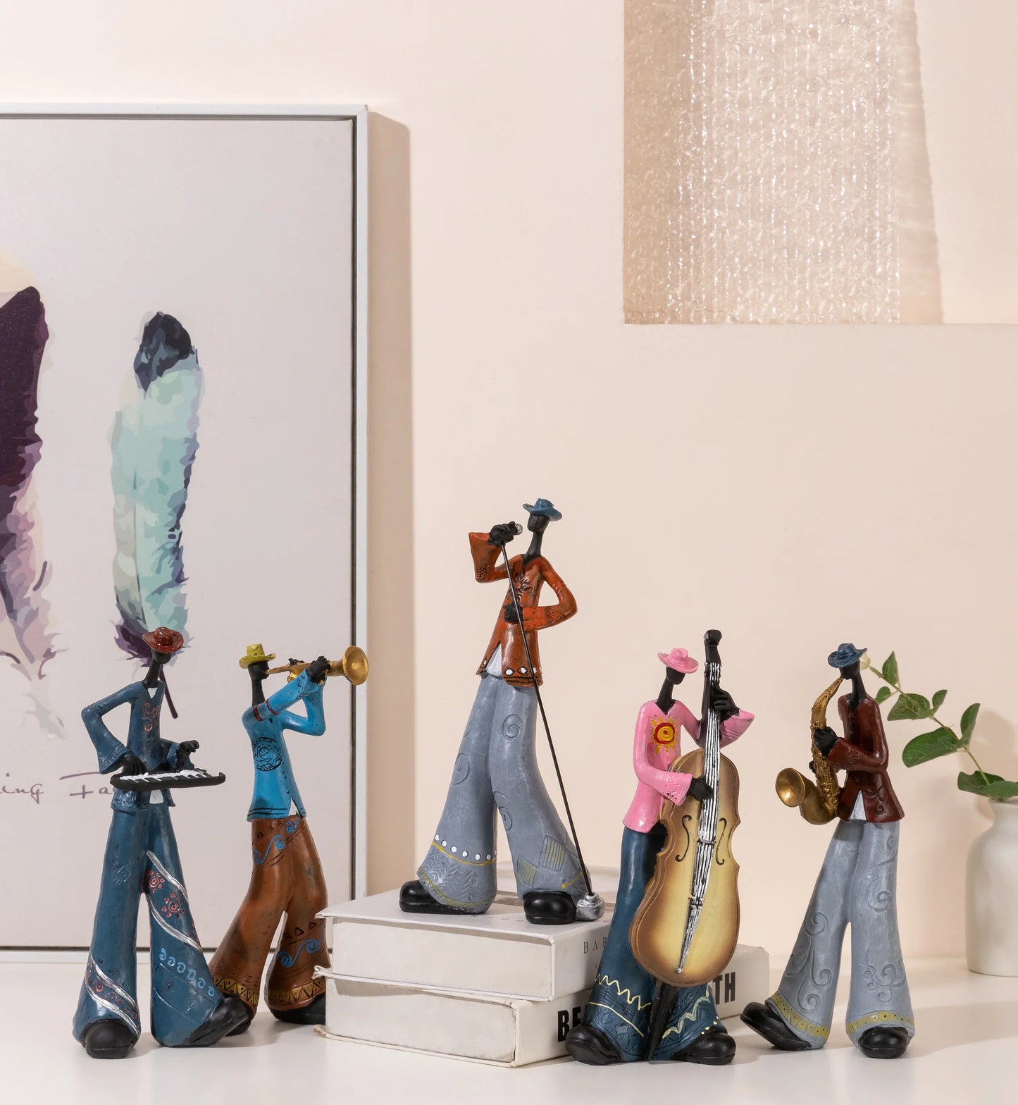 A set of five colorful creative american band figurines in wide-legged pants holding musical instrument models for study nordic arts decor