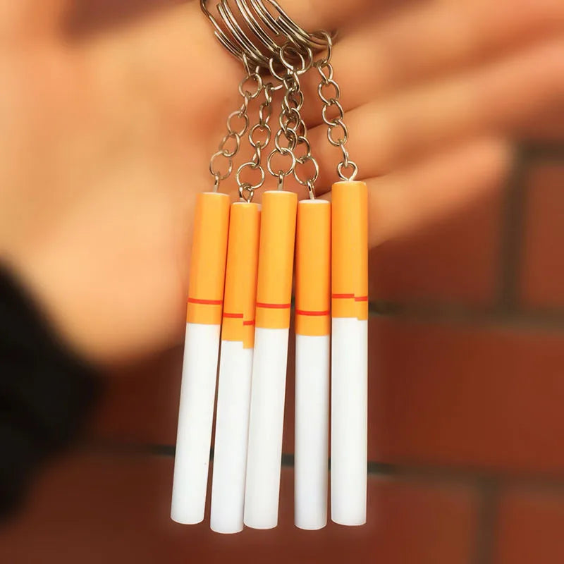 Set of five orange and white creative simulation pvc cigarette key chain bag pendant accessories on metal ring