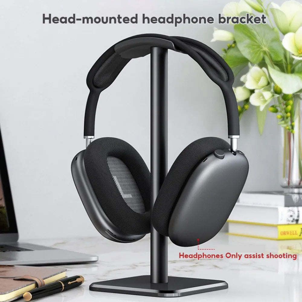 Black heavy duty curved earphone stand holding black wireless gaming earphones for airpods max and airpods pro