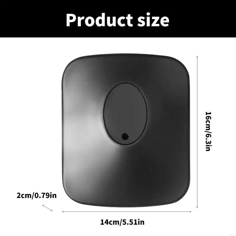 Black square-shaped smart home device with rounded edges and central oval button for professional studio monitors