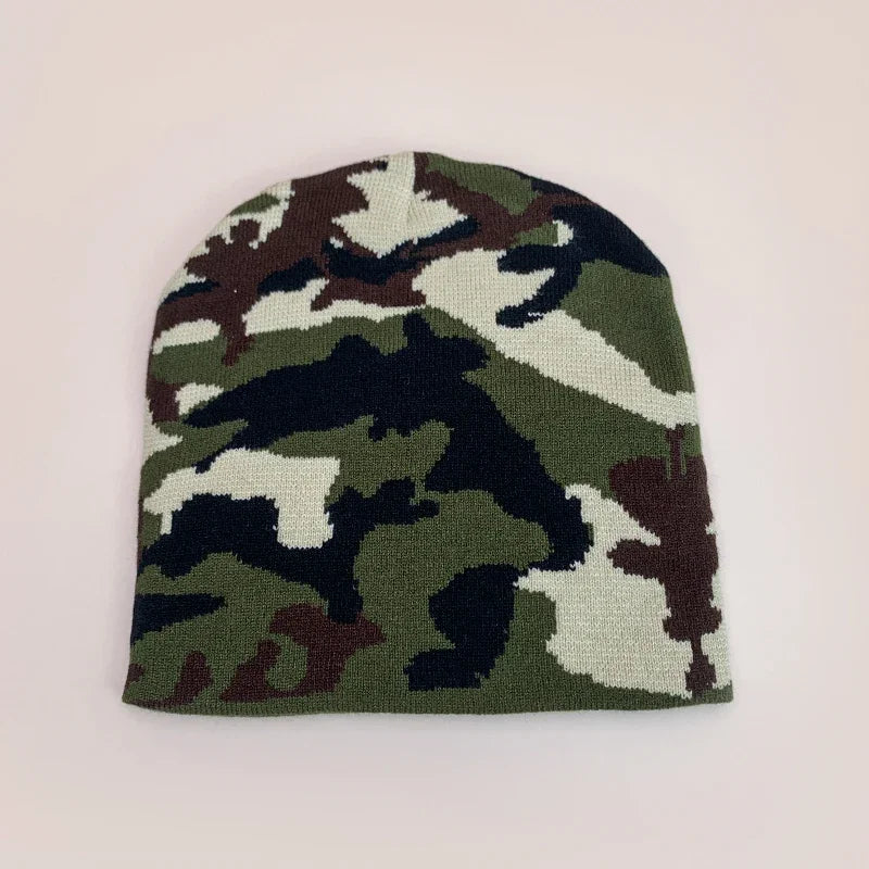 A european camouflage knitted beanie in green brown and black designed as a warm hip hop outdoor retro beanie