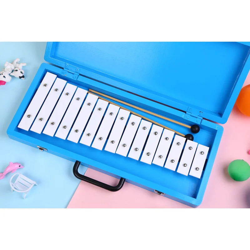 Blue wooden case containing a white metal glockenspiel xylophone with silver tuning pins and wooden mallet 15-key marching glockenspiel