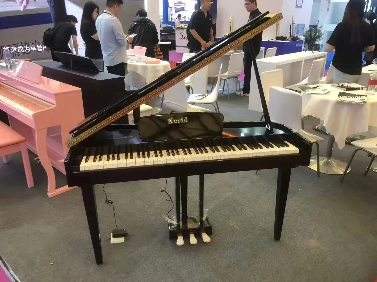 Black korg grand piano electronic with glossy finish and 88 white and black keys for professionnel keyboard use