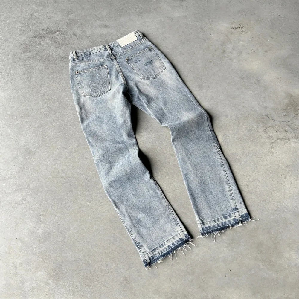 Light-wash denim pants y2k retro with frayed hems and subtle distressing on the back pockets high street straight gothic tassel casual