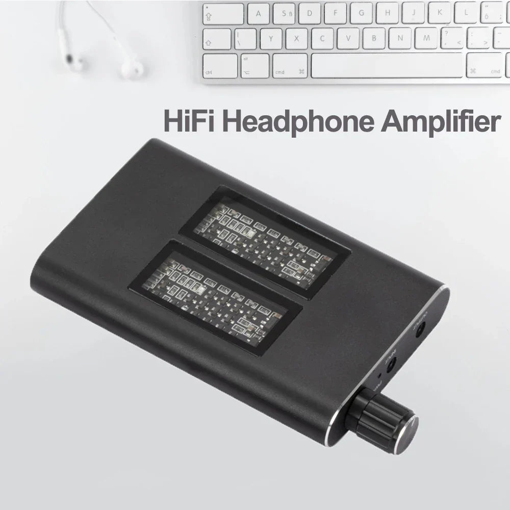 Black rectangular hiFi headphone amplifier with two circuit boards and a volume knob jack aux portable adjustable audio amp
