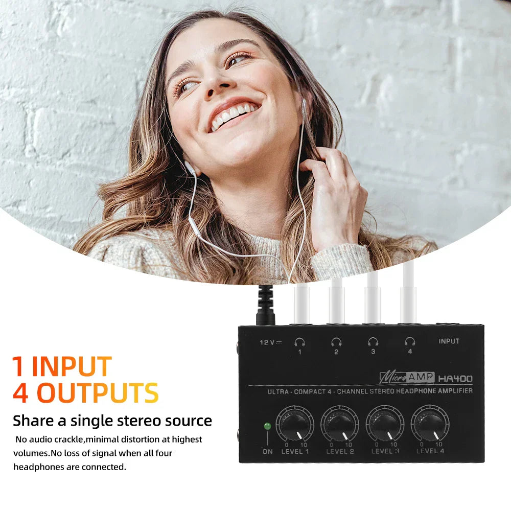 Black micra amp ha400 ultra-compact 4-channel headphone amplifier with volume control and 6.35mm jack input output ports