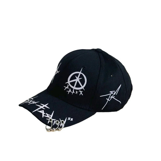 Black baseball cap with white anarchist symbol and silver chain accessory featuring graffiti color-block pattern for streetwear