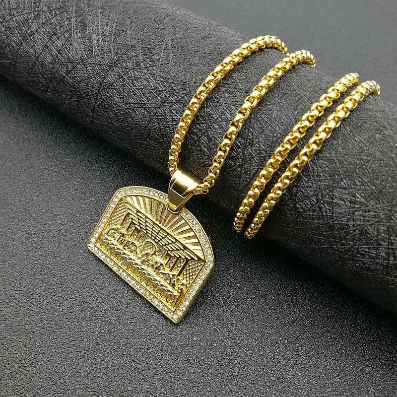 Gold-colored stainless steel hip hop bling pendant necklace with engraved sunburst rays and diamond embellishments for men rapper jewelry