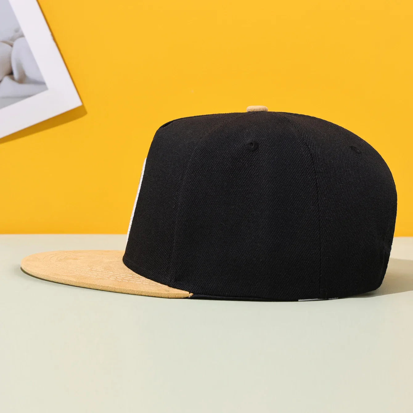 Black snapback hip hop fashion flat brimmed hat with tan brim and button for leisuretrendy cool outdoor use