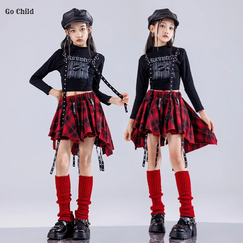 Red and black plaid asymmetrical skirt with black straps and silver studs for hip hop girls street dance cargo style