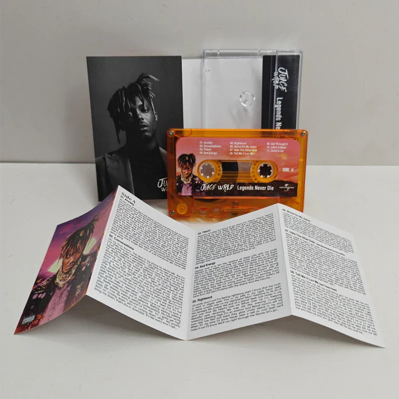 Transparent orange hip hop legends tape juice wrld cassette with pink label in recorder soundtracks box collection