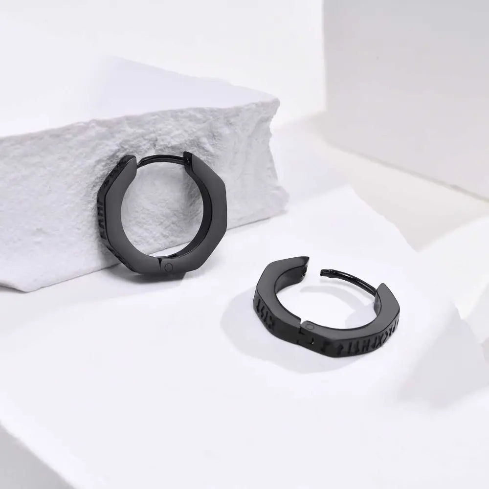 Black octagonal stainless steel hoop earrings with matte finish and subtle engraved detailing for streetwear use