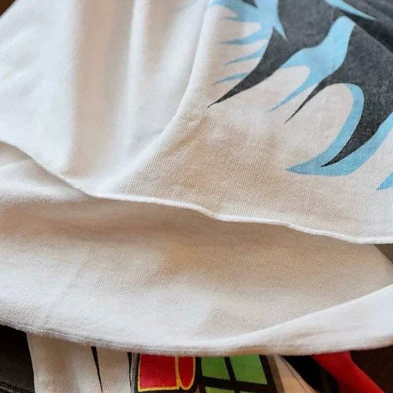 White cotton high quality oversized t-shirt with blue and black racing style graffiti hip hop retro graphic design