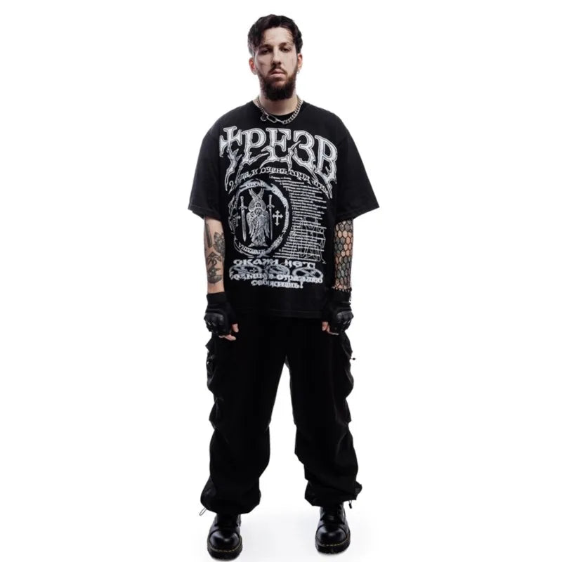 Black cotton men tshirt oversize with white graphic print y2k featuring a figure holding a cross for hip hop streetwear