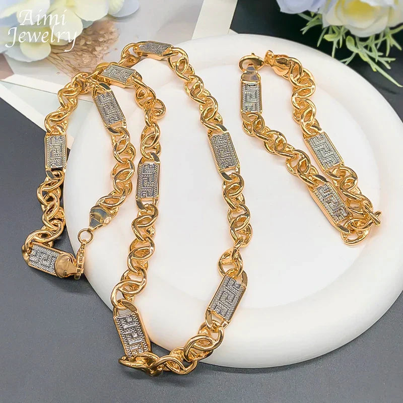 Gold-plated hip hop trendy african jewelry set with chunky necklace and bracelet featuring silver greek key pattern inlays