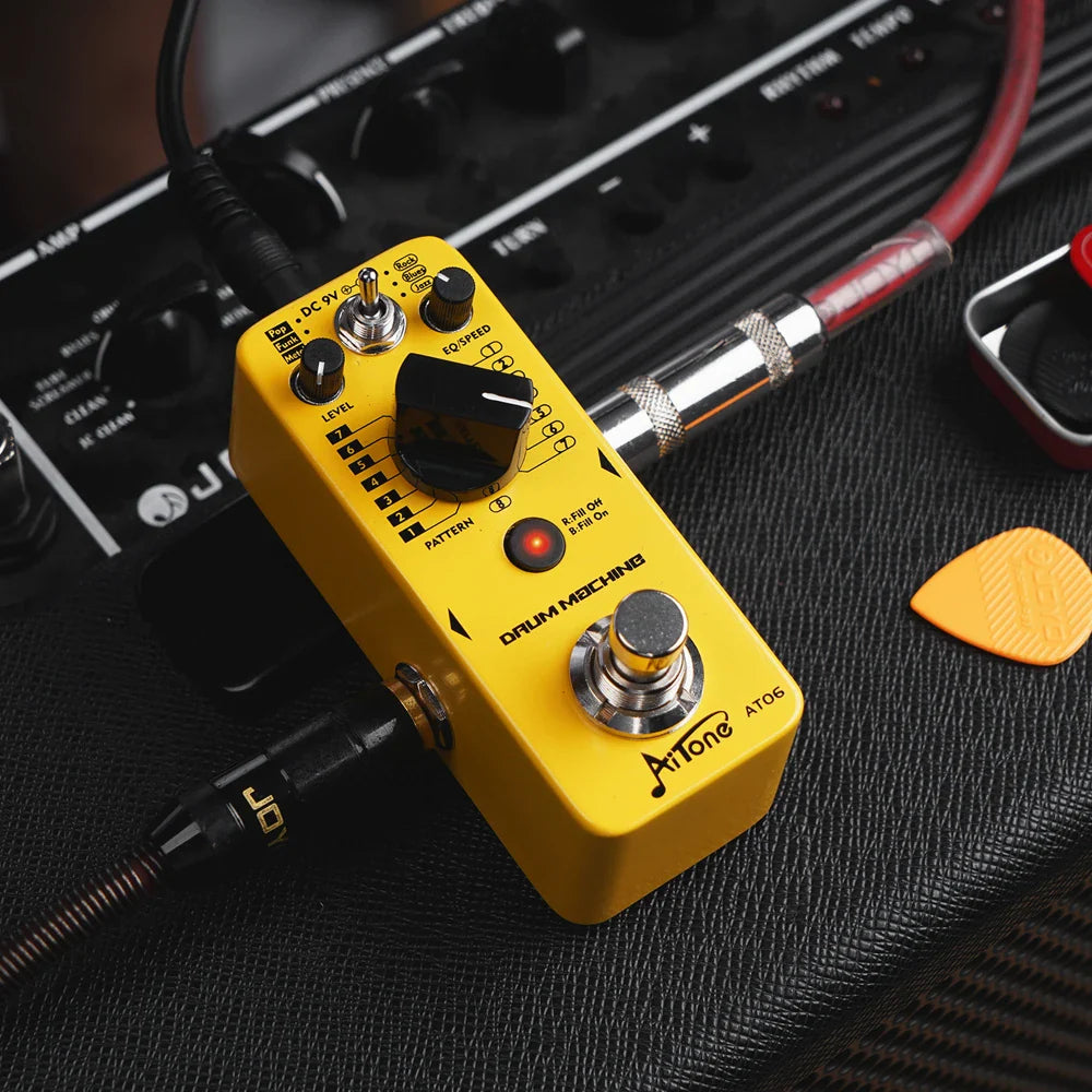 Yellow joyo aitone series at06 drum machine guitar pedal with black knobs red led and 48 drum grooves for real-time fill