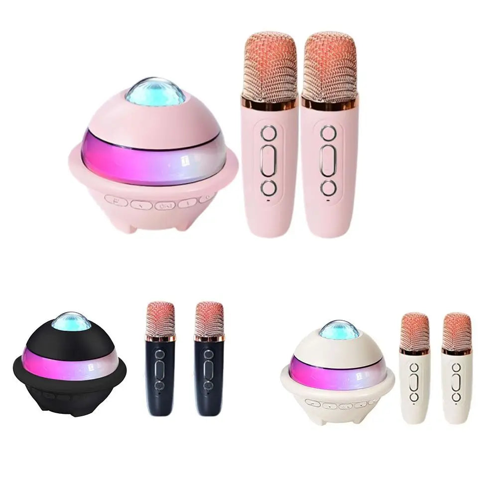 Pink and white karaoke machine mini with wireless dual microphones and projector night light featuring rose gold accents