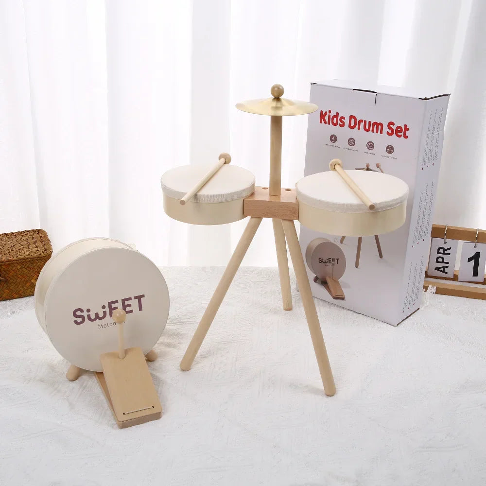 Wooden kids drum set with cream drums and light wood frame featuring sweet logo educational percussion toy