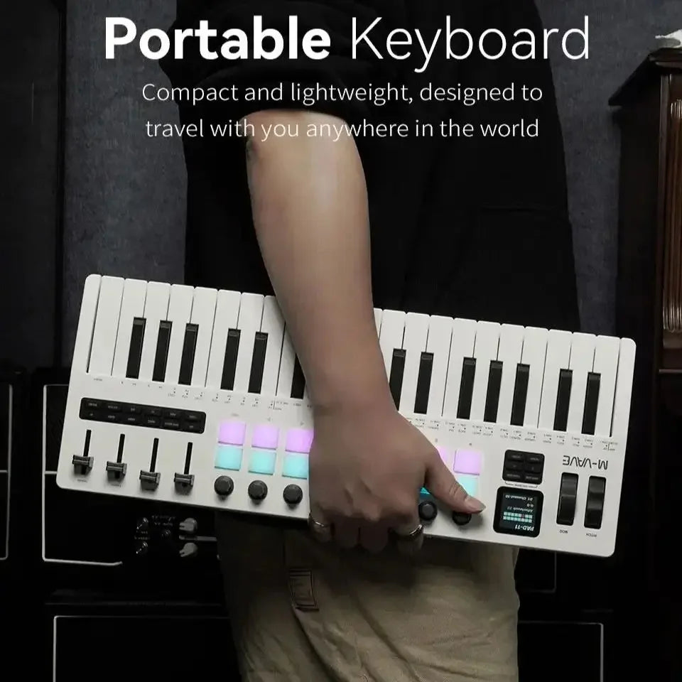 White m-audio m-vave smk-37 pro 37 key midi keyboard with illuminated purple and blue drum pads sound and wireless connection