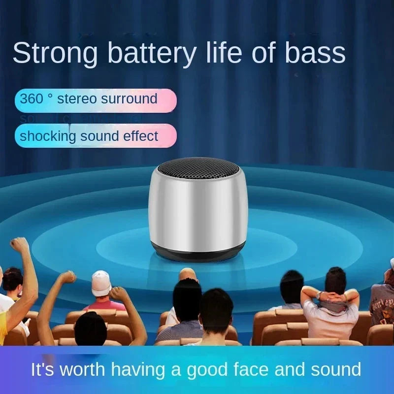 Silver cylindrical portable bluetooth haut-parleur with black mesh grille featuring full-range audio crossover and surround mini usb