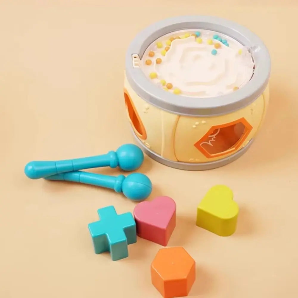 Yellow plastic montessori musical drums set percussion with gray rim and colorful geometric shapes for baby musical instrument use