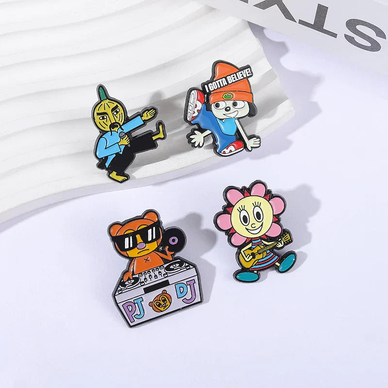 Set of four colorful enamel pins featuring berri game role characters in music-themed lapel badge funny jewelry design