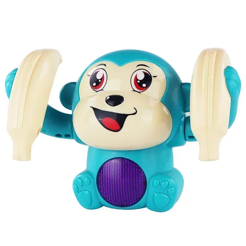 A cheerful turquoise plastic musical crawling monkey toy with cream arms and purple speaker for tummy time gifts