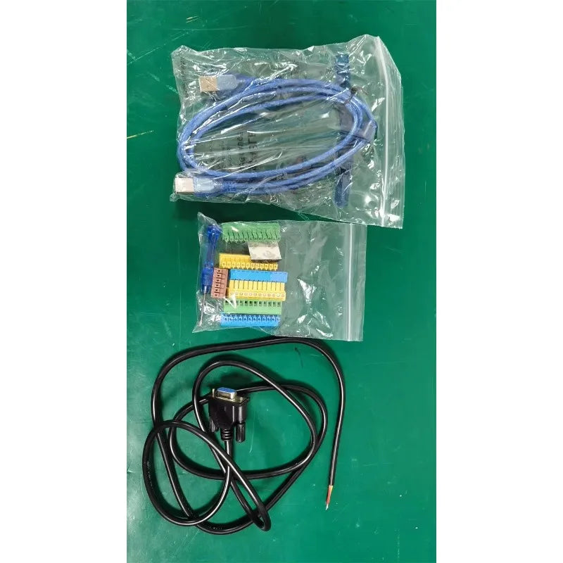 Blue and black computer cables with connectors in clear plastic bags for professional digital audio processor board conference speaker management