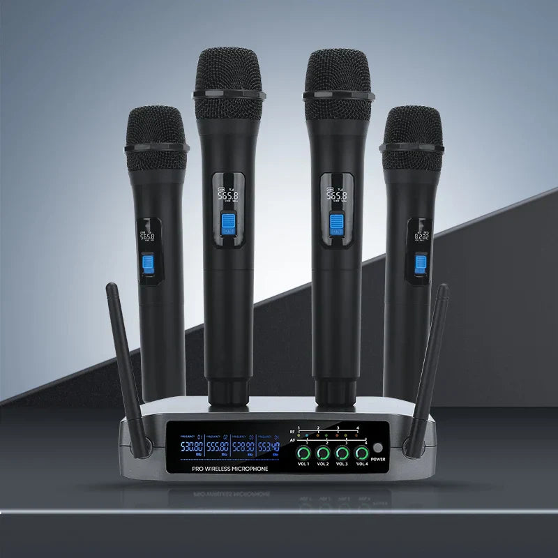 Set of four black professional vhf wireless channel handheld karaoke microphones with blue displays and silver receiver base for home party church events