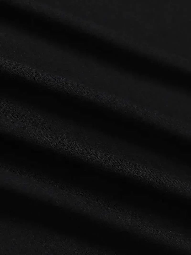 Black satin fabric with smooth glossy finish and subtle sheen in rapper anuel aa real hasta la muerte t shirt