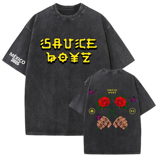 Black oversized t-shirt with faded yellow sauce boyz text and rose and fist graphic on back vintage washed fabric for rapper eladio carrion album don kbrn fashion hip hop