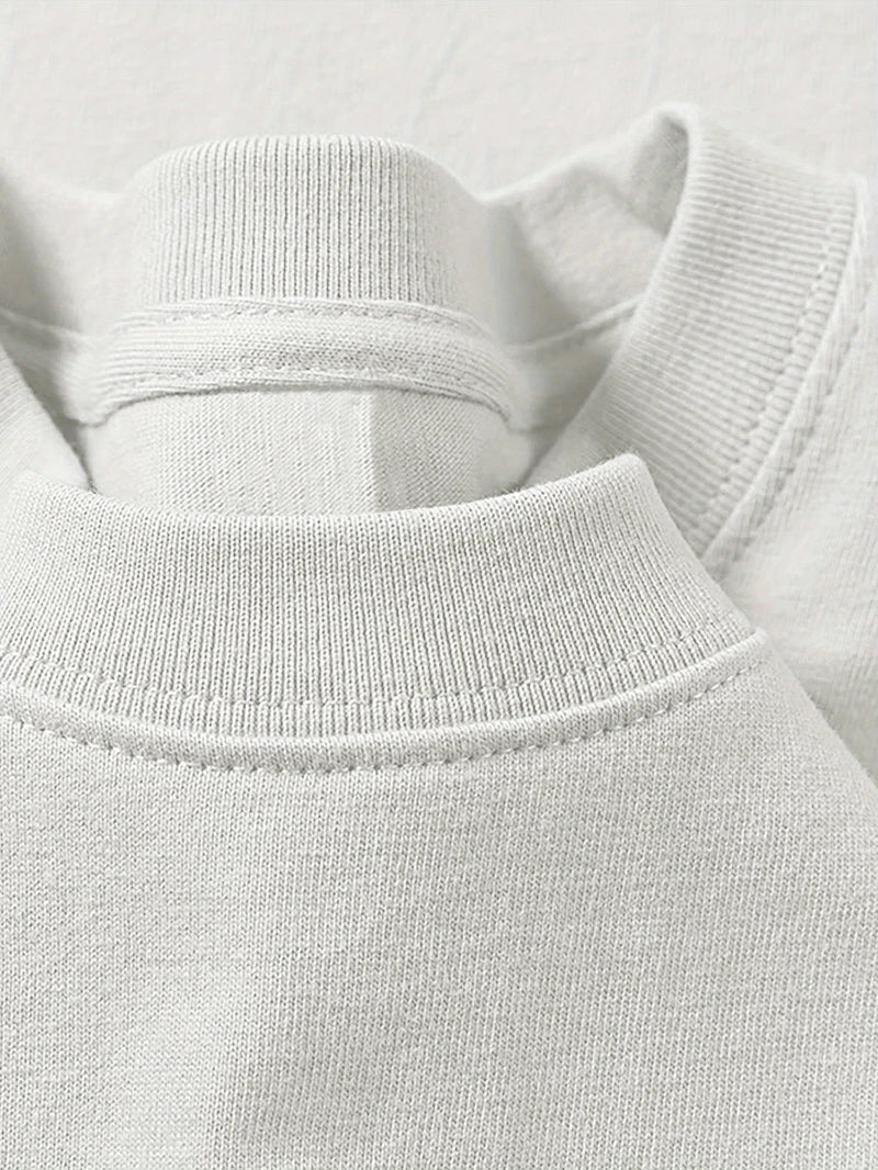 A soft off-white cotton crewneck sweater with ribbed collar and seams for rapper frank retro y2k unisex blond fashion